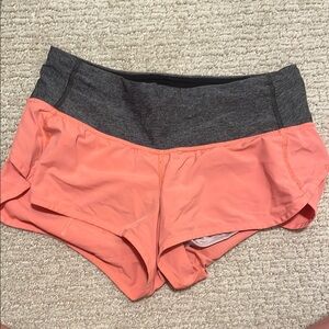 Women's orange/coral Lululemon speed up shorts size 4